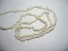 10 x strings of white stone chips 10 x strings of white stone chips