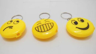 12 Light Up Smile Face Torches Key Ring Keyrings - Click Image to Close